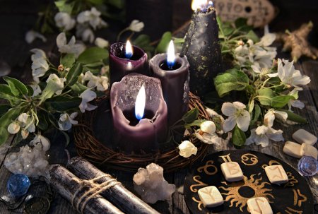 depositphotos_200253928-stock-photo-black-candles-runes-zodiac-circle